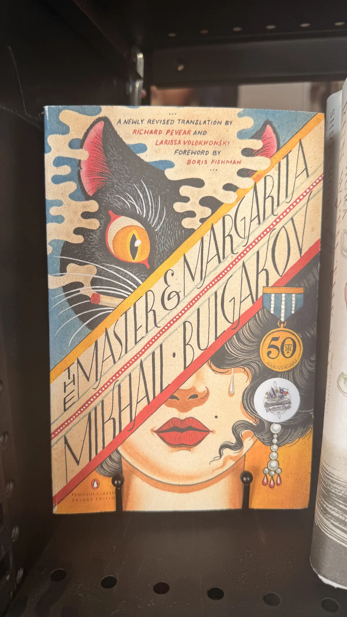 Close-up of The Master and Margarita by Mikhail Bulgakov with a Bluebonnet Books sticker.