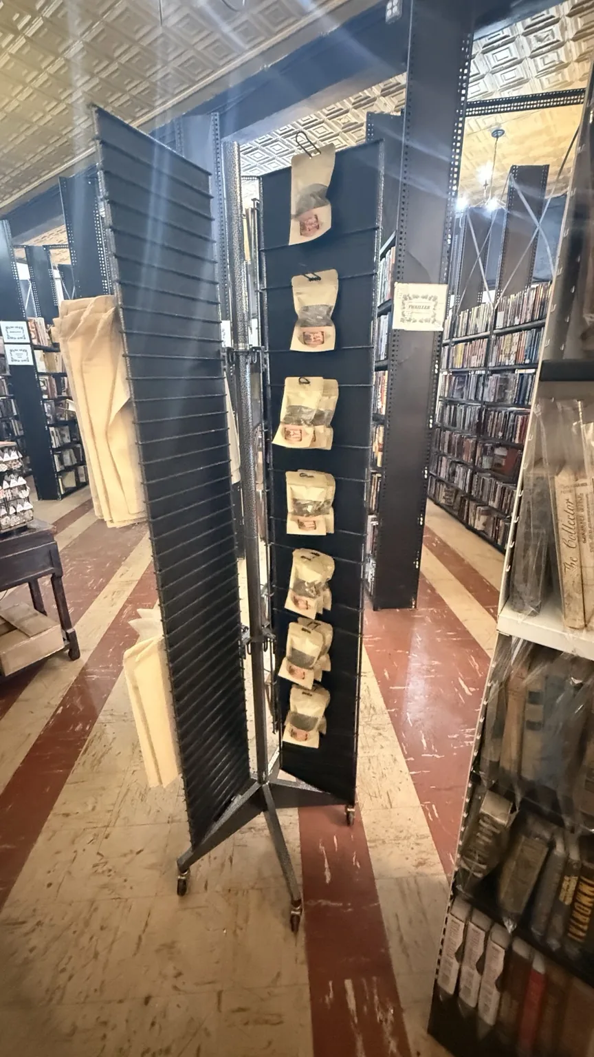 Merchandise display rack inside the bookstore.