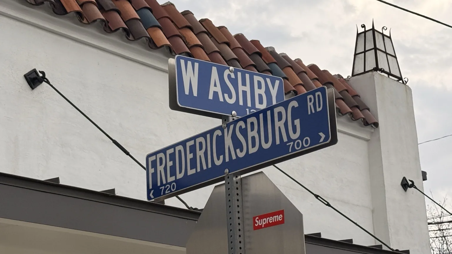 Street sign at Fredericksburg Road and Washby near the bookstore.